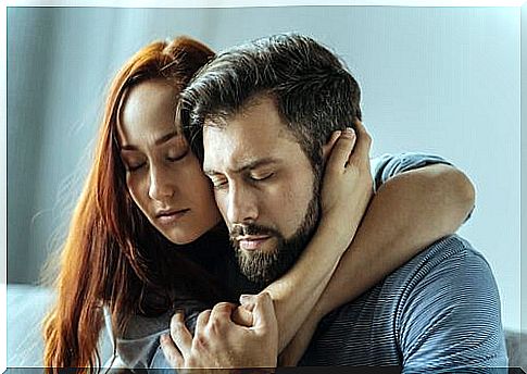 Couple embraced with closed eyes