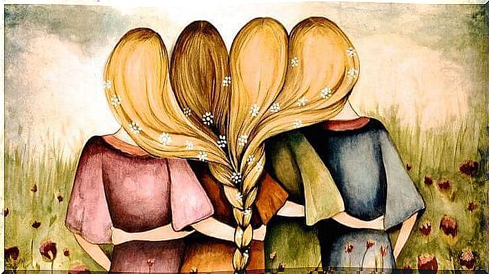 three girls hug each other