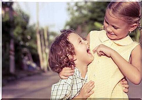 Brothers laughing happily.