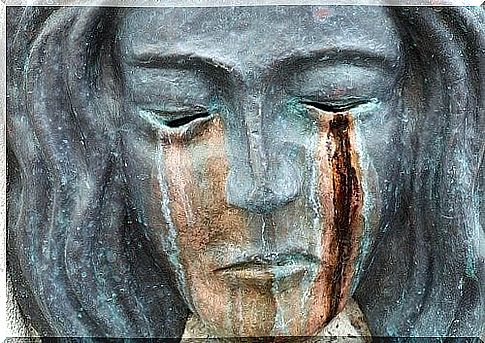 Crying female sculpture.