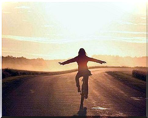 Happy woman on bicycle