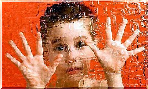 Child trapped behind opaque glass