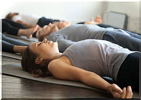 Woman performing progressive muscle relaxation