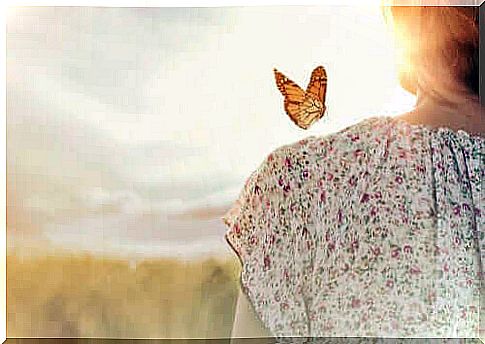 Woman from behind with butterfly