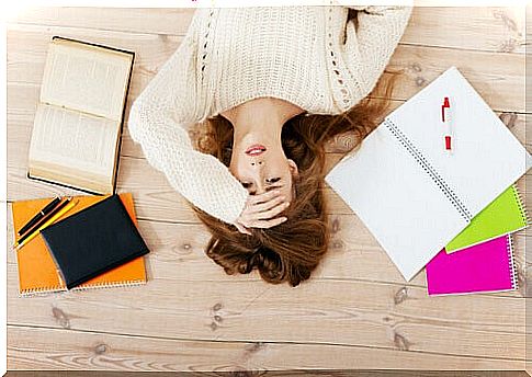 stressed-out-woman-lying-on-the-ground