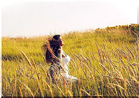 Woman walking in a field