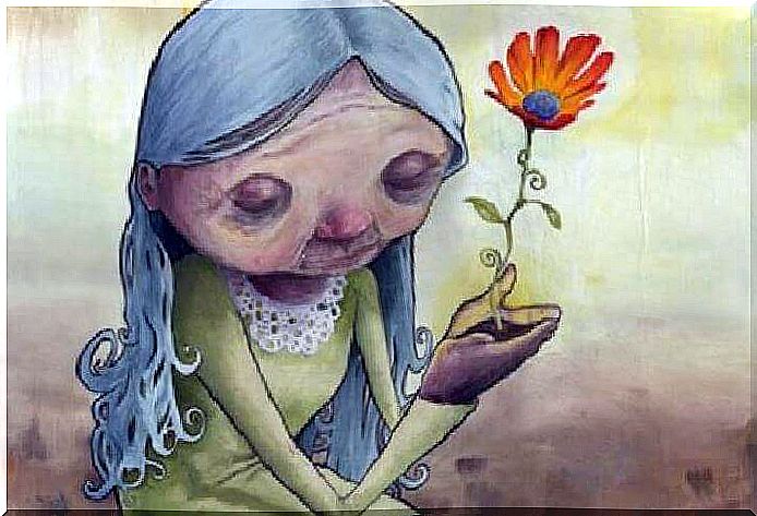 old lady with flower in her hand